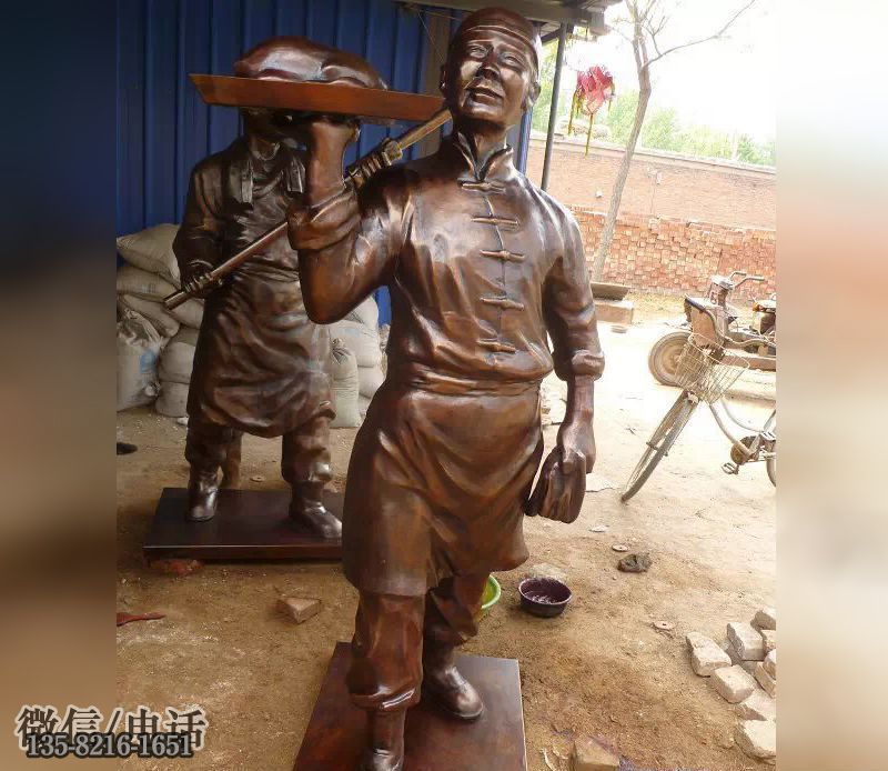 玻璃鋼迎賓仿銅店小二雕塑 玻璃鋼迎賓仿銅店小二雕塑